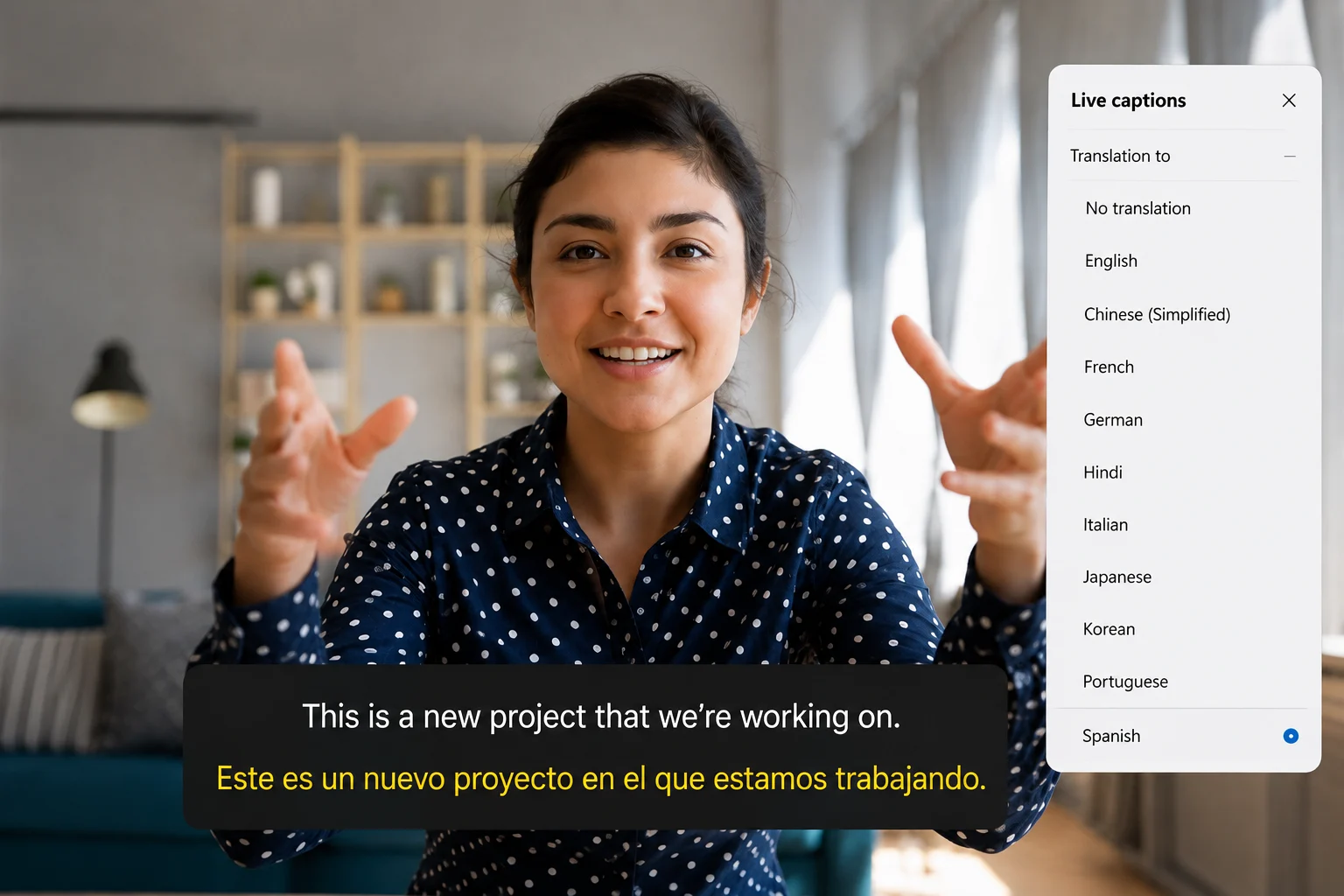 AI Live Captions translating spoken English into Spanish in real time.